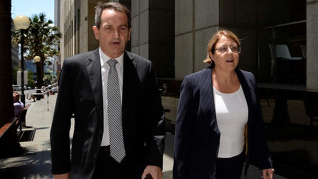 Francis Sullivan of the Catholic Church's Truth, Justice and Healing Council and Mary Rogers, facilitator, Queensland Professional Standards Office, leave the Royal Commission into Institutional Responses to Child Sexual Abuse in Sydney on Tuesday. Photo: Dan Himbrechts