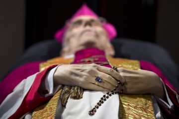 The body of Dutch former Roman Catholic bishop of Roermond and of the Diocese of Reykjavik, Jo Gijsen, placed up on a bier in a monastery in Sittard on June 26, 2013. Gijsen died on June 24, aged 80. (Marcel Van Hoorn/Getty Images)