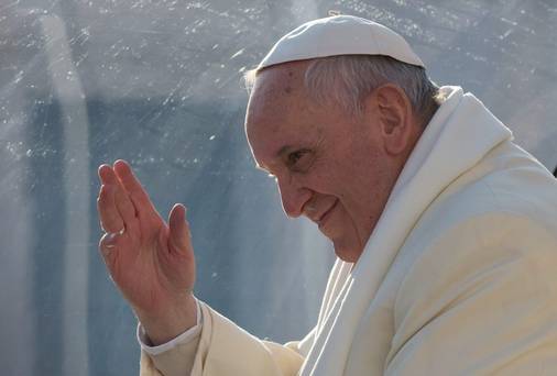 Pope Francis waves as he leaves after his weekly general audience in St. Peter's Square at the Vatican earlier this week