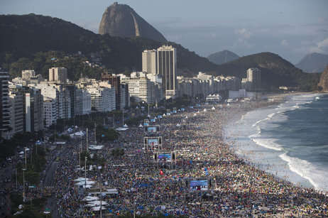 Pilgrims and residents gather on Copacabana beach before the arrival of Pope Francis for World Youth Day in Rio de Janeiro in July.