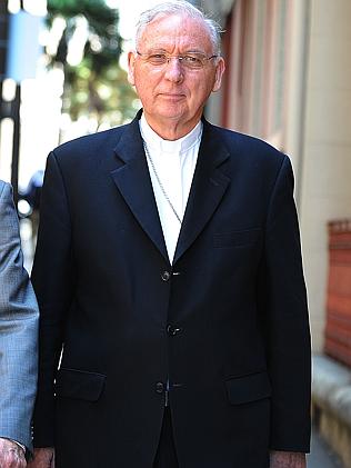 Bishop of Lismore Geoffrey Jarrett leaves the Royal Commission into Institutional Responses to Child Sexual Abuse. Source: News Limited
