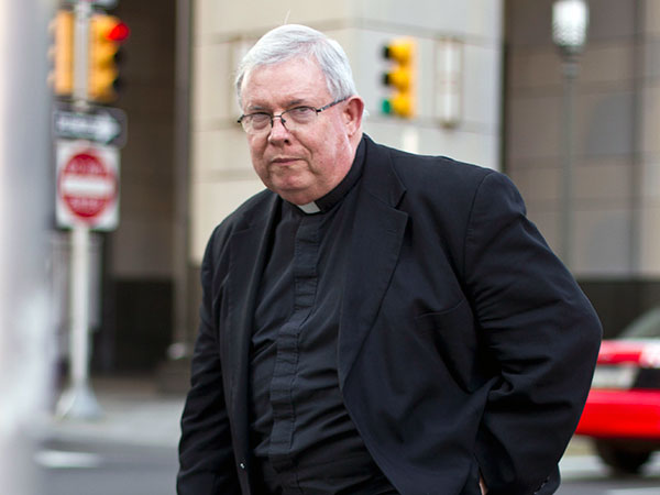 Monsignor William Lynn served 18 months of his three-to-six-year term for child endangerment before the state Superior Court overturned his conviction on Thursday. (AP Photo/Matt Rourke, File)