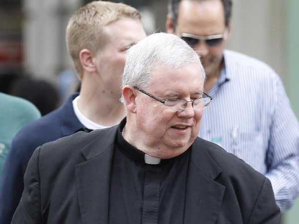 FILE - Msgr. William J. Lynn leaves the Criminal Justice Center after testifying in a sex-abuse trial on Wednesday, May 23, 2012. The criminal case against Lynn was dismissed Thursday. ( Yong Kim / Staff Photographer )