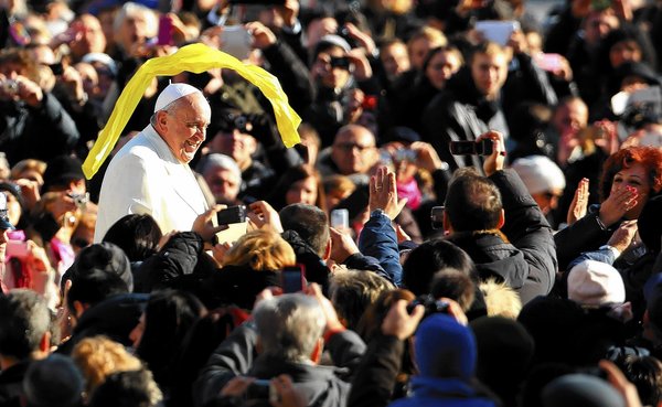 Pope Francis, shown arriving for his weekly audience at the Vatican earlier this month, has reaffirmed the Holy See's censure of a group of U.S. nuns. But he's also made many statements suggesting that he supports them. (Franco Origlia / Getty Images / December 4, 2013)
