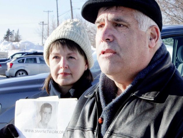 With his wife, Mary, by his side, Verne Wagner, northern Minnesota director of the Survivor Network of those Abused by Priests, reacts to the Diocese of Duluth’s release of the names of priests credibly accused of sexually abusing minors, Tuesday, Dec. 31, 2013. Photo: Steve Kuchera, AP