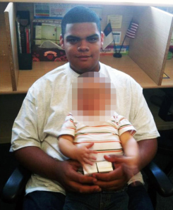 Johnny Beserra III is shown holding a child in a picture posted to his MySpace page.