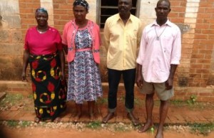 Timothy Ngwu, second from right and two of the concubines