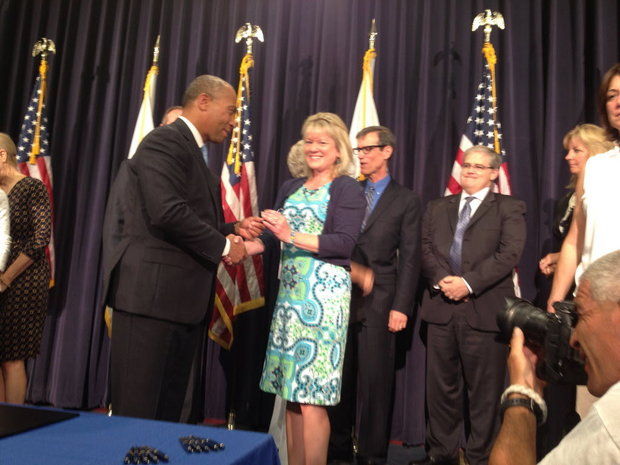 Massachusetts Gv Deval Patrick with Kathy Picard of Ludlow, who advocated for passage of a bill extending the statute of limitations in civil child sexual abuse cases in Massachusetts. (Submitted photo)