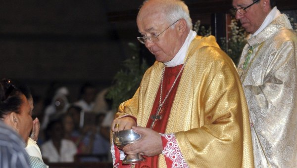 In this March 15, 2013, Archbishop Josef Wesolowski, papal nuncio for the Dominican Republic, leads a Mass in Santo Domingo, Dominican Republic