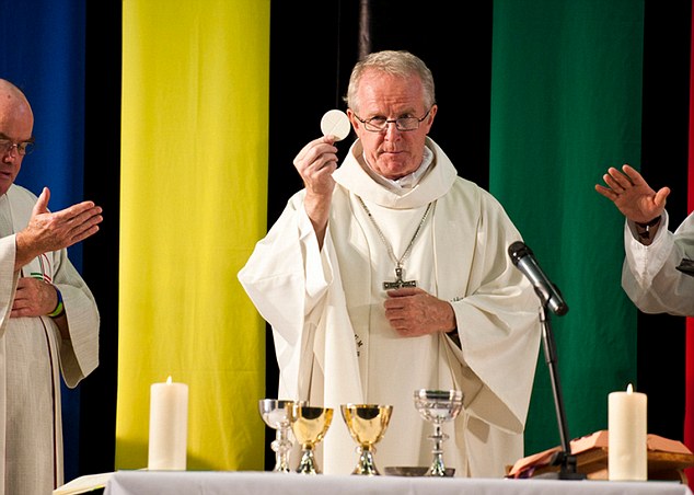 Transubstantiation: Bishop Conry gives mass. He confessed his misbehaviour in a statement yesterday