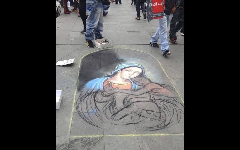 A chalk drawing of the Virgin and Child in downtown Santiago, Chile, where Catholic symbols are everywhere (Melinda Henneberger)