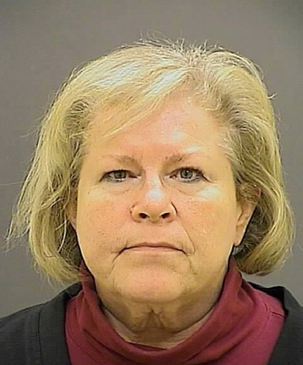 Heather Cook arrest photo, provided tonight after she was charged with DUI, manslaughter and leaving the scene of an accident.