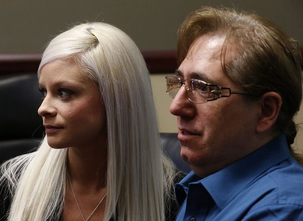 Vanessa DeRosa, 25, and Tino Flores, 51, who claim they were sexually abused by representatives of the Buffalo Diocese are trying to reach out to Pope Francis to investigate the Diocese of Buffalo’s handling of sexual abuse complaints. They had a press conference at Hogan Willig law offices in Amherst onTuesday, Jan. 27, 2015. (Robert Kirkham/Buffalo News)