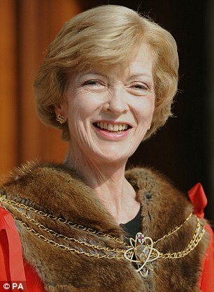 Fiona Woolf (left) resigned as committee chair - becoming the second inquiry head chosen by Theresa May (right) to step down