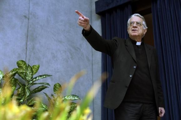 Vatican spokesman Reverend Federico Lombardi gestures as he arrives at the first briefing of the Pontifical Commission for the Protection of Minors at the Holy See press office at the Vatican in this file photo taken on May 3, 2014.