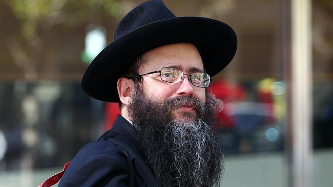Rabbi Yosef Feldman leaves the Melbourne County Court after giving evidence at the Royal Commission into child sexual abuse.
