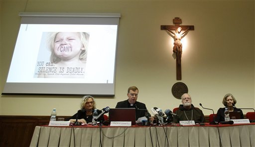 From left, Karlijn Demasure, Executive Director of Centre for Child Protection, Father Hans Zollner, President of Centre for Child Protection, Cardinal Sean Patrick O'Malley and professor Sheila Baronessa Hollins attend a press conference at the Pontifical Gregorian University in Rome, Monday, Feb. 16, 2015. Pope Francis' point man on clerical sex abuse says the failure of the church to punish bishops who covered up for pedophiles has seriously hurt its credibility and that the church must now lead the way by "humbly making the commitment to accountability, transparency and zero tolerance." Cardinal Sean O'Malley said canon lawyers and theologians were reviewing proposals for the pope on holding bishops accountable that were developed by Francis' commission of experts, which he chairs and includes two abuse survivors. ISABELLA BONOTTO — AP Photo Vatican Sex Abuse