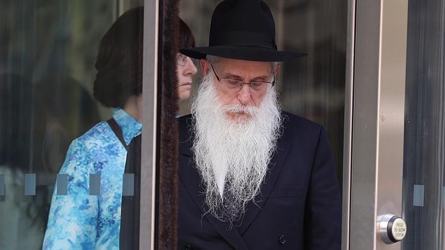 Rabbi Abraham Glick leaves the Victorian County Court after giving evidence in the royal commission.