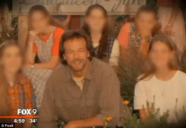The 53-year-old faces 59 counts of criminal misconduct after two women said they were among ten girls (Barnard above with girls) and women, who were chosen to live apart from their families in a camp that he set up in rural Minnesota