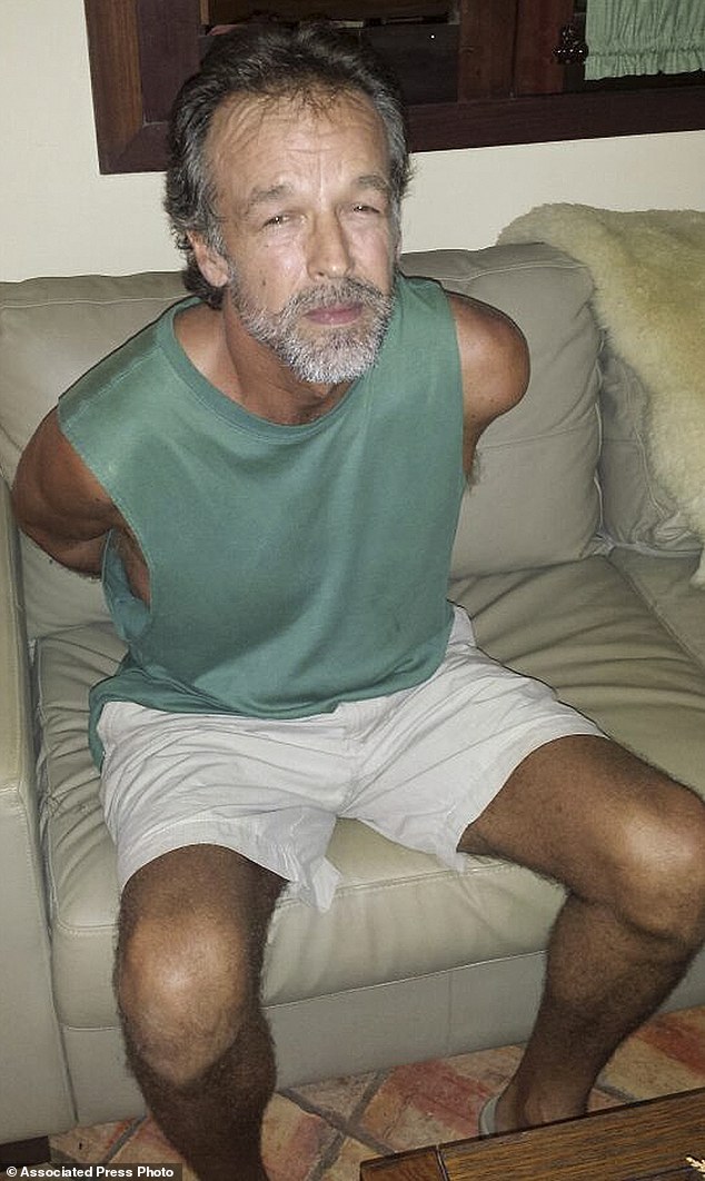 Self-professed minister and one of America's Most Wanted, Victor Arden Barnard (above), for allegedly molesting two girls in a 'Maidens Group' has been arrested following a year-long search, according to Brazilian authorities