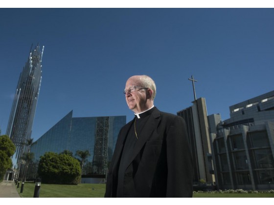 Bishop Kevin Vann of the Diocese of Orange stands outside the Christ Cathedral in Garden Grove last week as it undergoes a two-year renovation to become a Catholic cathedral.