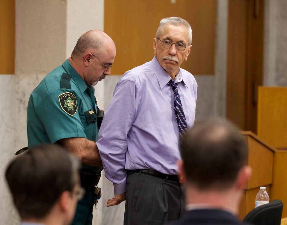 A Multnomah County Sheriff's deputy takes Happy Valley pastor Mike Sperou into custody after he was found guilty in Multnomah County district court on Apr. 30, 2015 and sentenced to 20 years in prison for abusing a girl who grew up in his church. Randy L. Rasmussen/Staff