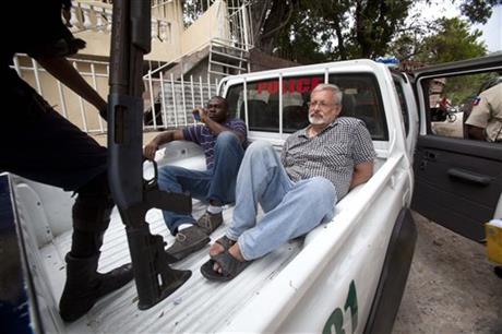 FILE - In this Friday, Sept. 5, 2014, file photo, U.S. citizen Michael Karl Geilenfeld waits in... Read more