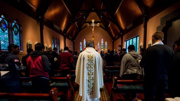 Catholic student priests during morning prayer at Corpus Christi College. Photo: Justin McManus