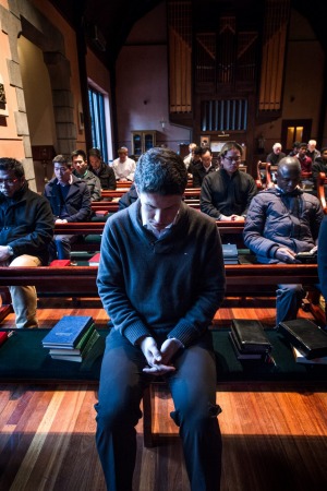 Catholic student priests at the Corpus Christi College during morning prayer. Photo: Justin McManus