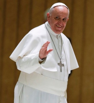 Pope Francis waves to the faithful at the Vatican. Photo: AP