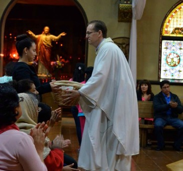 Rev. Brendan Curran at St. Pius V in Pilsen. St. Pius V Facebook