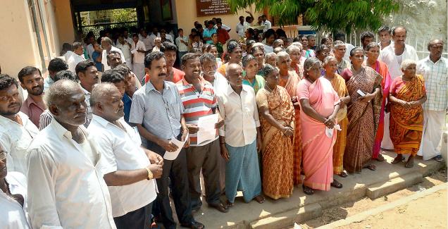 Villagers thronging Tuticorin Bishop House on Tuesday.— Photo: N. Rajesh