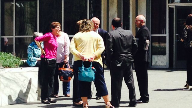 About 75 people came to speak on behalf of Wallin including fellow priests. (WFSB)