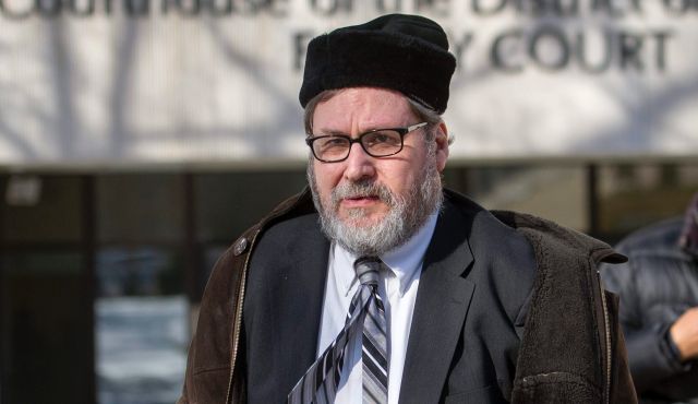 Rabbi Barry Freundel leaves the D.C. Superior Court House in Washington, Thursday, Feb. 19, 2015. Photo by AP
