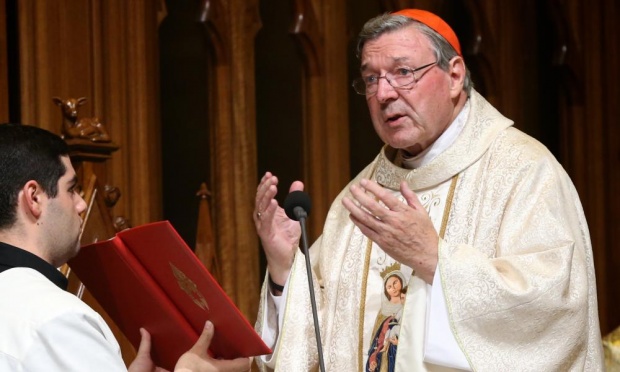 Cardinal George Pell celebrates mass in Sydney in 2014 before leaving for his new position at the Vatican. Photograph: Jane Dempster/AAP