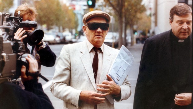 Disgraced priest Gerald Ridsdale outside court with then Archbishop of Sydney George Pell, in 1993. Photo: Geoff Ampt