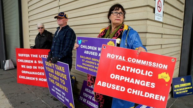 Protesters at the Royal Commission into Institutional Responses to Child Sexual Abuse in Ballarat Magistrate's Court on Tuesday. Photo: Pat Scala