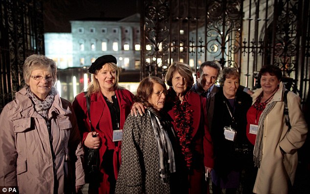 (Left to right) Marina Gambold, Maureen Sullivan, Mary McGuinness, Kathleen Janette, Steven O'Riordan, Geraldine Cronin and Julie McClure of of Madalene Survivors Together leaving Leinster House in Dublin after hearing Taoiseach Enda Kenny's state apology