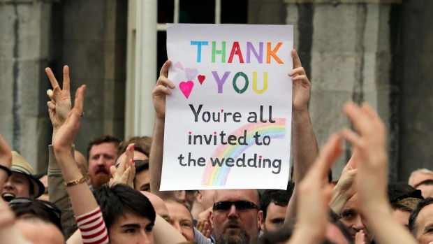 A supporter holds a sign during celebrations of the vote to legalise same-sex marriage in Ireland. Photo: AFP