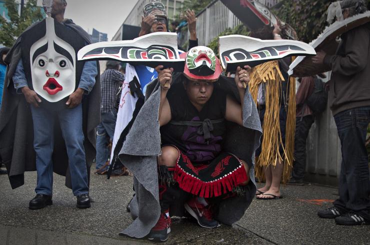 A report from Canada's Truth and Reconciliation Commission found that over 6,000 children died while in residential schools. In this photo, First Nations' participants wear traditional masks while waiting to take part in a Truth and Reconciliation march in Vancouver, British Columbia on Sept 22, 2013. Reuters/Andy Clark