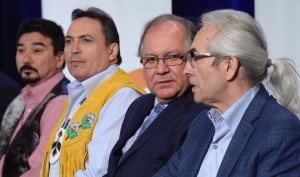 Former Grand Chief of the Assembly of First Nations Phil Fontaine (right to left), Aboriginal Affairs Minister Bernard Valcourt, current AFN Chief Perry Bellegarde and National Inuit Leader Terry Audla, President of Inuit Tapiriit Kanatami, look on at the release of the report on Canada's residential school system at the Truth and Reconciliation Commission in Ottawa on Tuesday, June 2, 2015. (Adrian Wyld/Canadian Press)