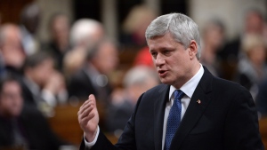 Prime Minister Stephen Harper spent Tuesday's question period defending his aboriginal affairs record. He wouldn't yet commit to any of the Truth and Reconciliation report's recommendations. (Sean Kilpatrick/Canadian Press)