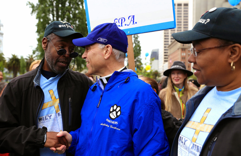 A supporter greets San Francisco Archbishop Salvatore J. Cordileone in San Francisco on May 16, 2015, in the midst of a public campaign of attack against the archbishop. The Archbishop Cordileone Support Day Family Picnic was organized by a group of San Francisco Catholics, led by Walk for Life West Coast co-chair Eva Muntean. Photo by Debra Greenblat, Catholic San Francisco, courtesy of Catholic News Service
