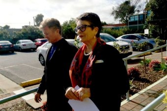 PHOTO: Vicar General Father Philip Marshall and Catholic Education SA director Helen O'Brien responded to the findings into the case of paedophile Brian Perkins. (ABC News: Loukas Founten)