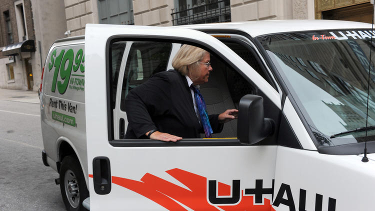 Former Episcopal Bishop Heather Cook gets into a U-Haul van after leaving the Mitchell Courthouse. She is charged with vehicular manslaughter in the drunken-driving death of bicyclist Tom Palermo. Her trial is postponed until September.