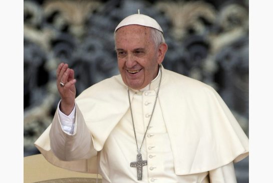 Pope Francis waves to faithful during his weekly general audience, in St. Peter's Square, at the Vatican on May 20. Prime Minister Stephen Harper has an audience with the Pope Thursday.