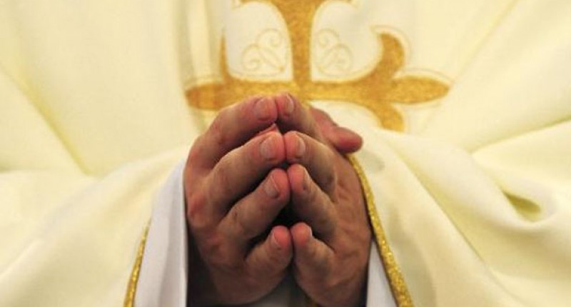 Photo of a Catholic priest (AFP)