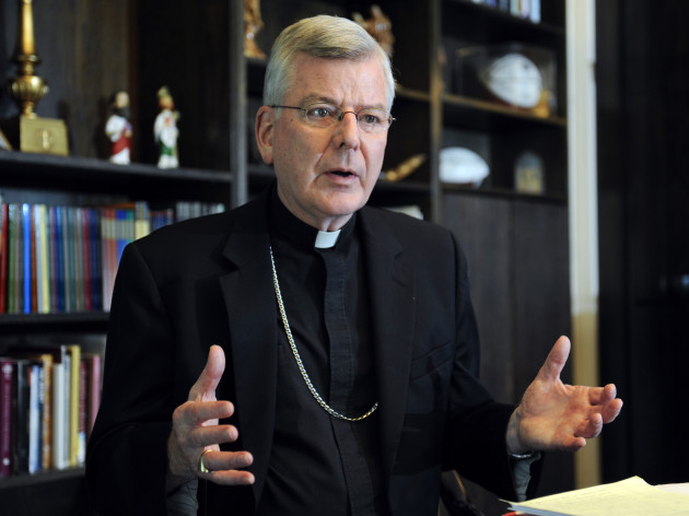 In this July 30, 2014, file photo, St. Paul-Minneapolis Archbishop John Nienstedt speaks at his office in St. Paul, Minn. On Monday, June 15, 2015, the Vatican said Pope Francis accepted the resignations of Nienstedt and Auxiliary Bishop Lee Anthony Piche after prosecutors charged the archdiocese with having failed to protect children from unspeakable harm from a pedophile priest. Craig Lassig | AP file