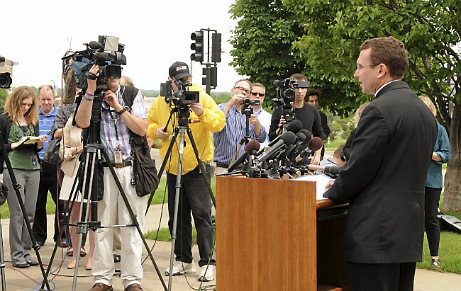 Auxillary Bishop Andrew Cozzens of the Archdiocese of Saint Paul and Minneapolis speaks about the resignations of Archbishop John Nienstadt and Auxiliary Bishop Lee Piche during a news conference outside the Archdiocese's chancery building in St. Paul on Monday, June 15, 2015. (Pioneer Press: Scott Takushi)