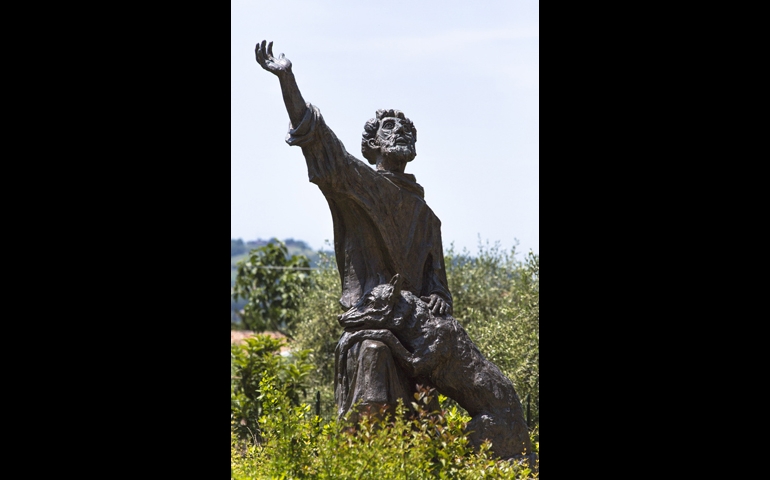 A statue of St. Francis of Assisi and a wolf in the town of Gubio, Italy (CNS/Octavio Duran)